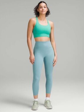 Lululemon Wunder Train High-Rise Tight 25"
Light Blue - tide teal size 6